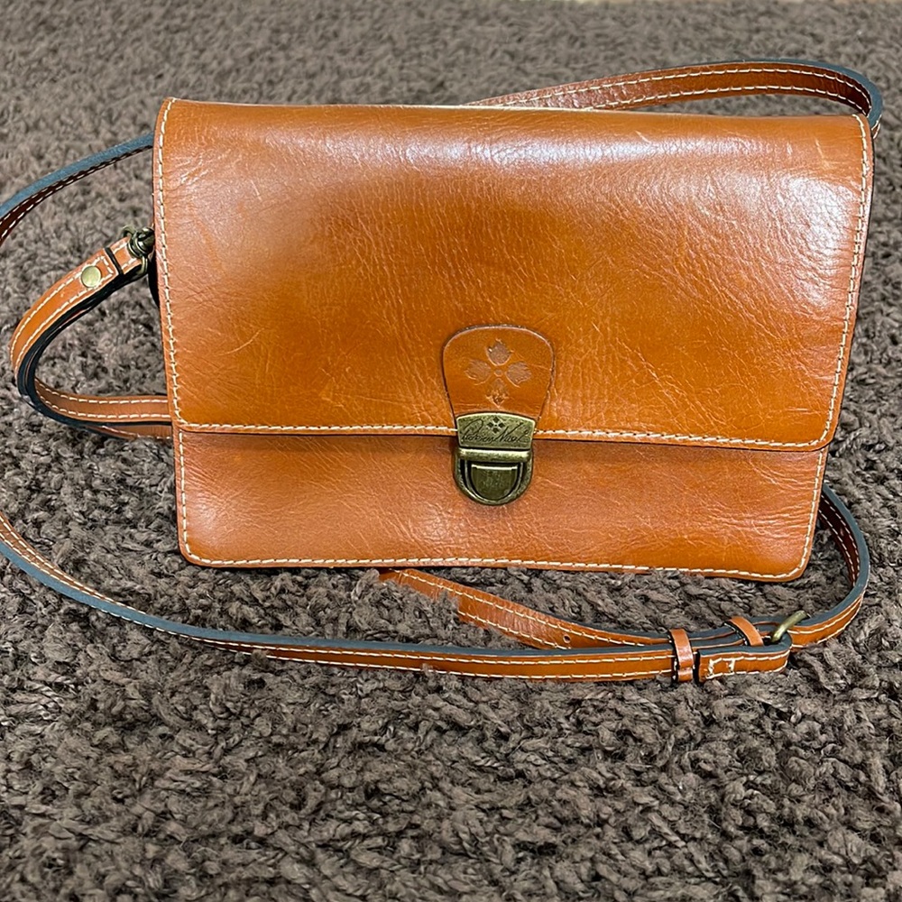 Gently used Patricia Nash Leather Crossbody Clutch